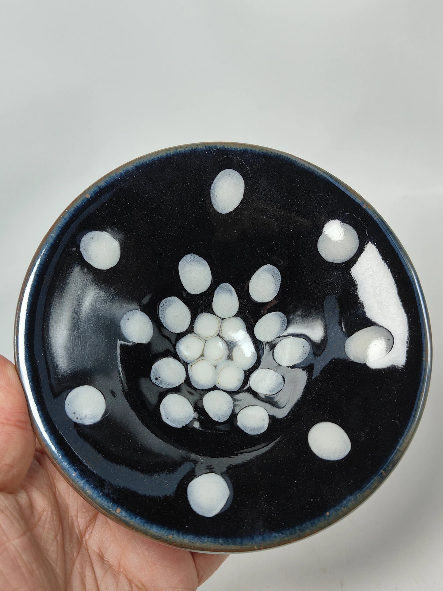 Black gold pearl spot